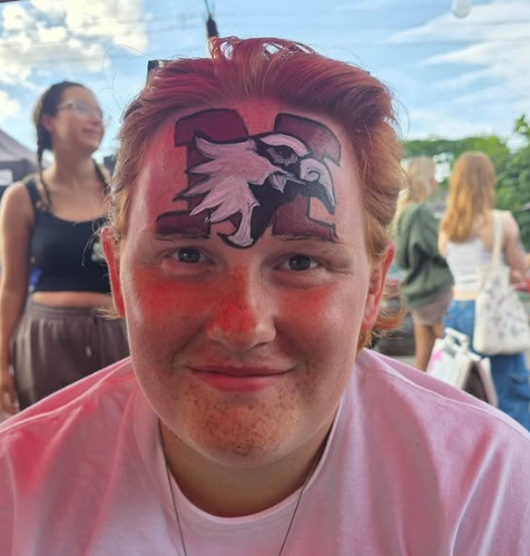 School mascot forehead face painting by Expressive Unicorns